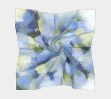 Load image into Gallery viewer, A misty blue and yellow square silk scarf with a flowing drape, featuring abstract floral patterns.